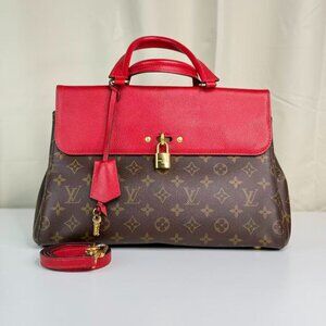 Louis Vuitton Monogram Canvas Shoulder Bag with Red Trim and Gold Lock Closure